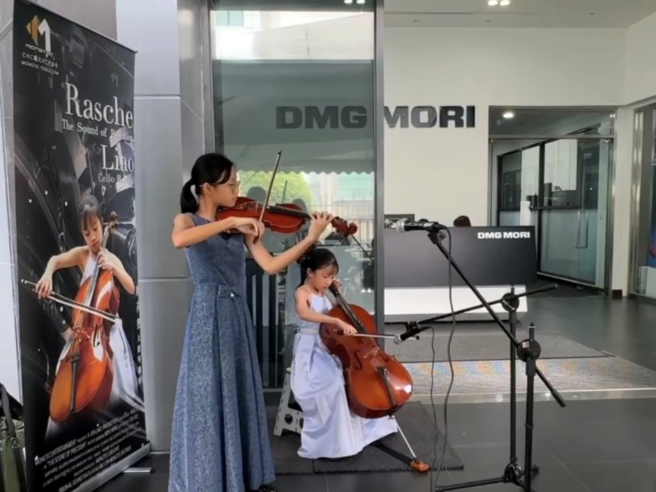 Nine-year-old cellist Rasche Liao performing The Sound of Precision at DMG MORI technology seminar